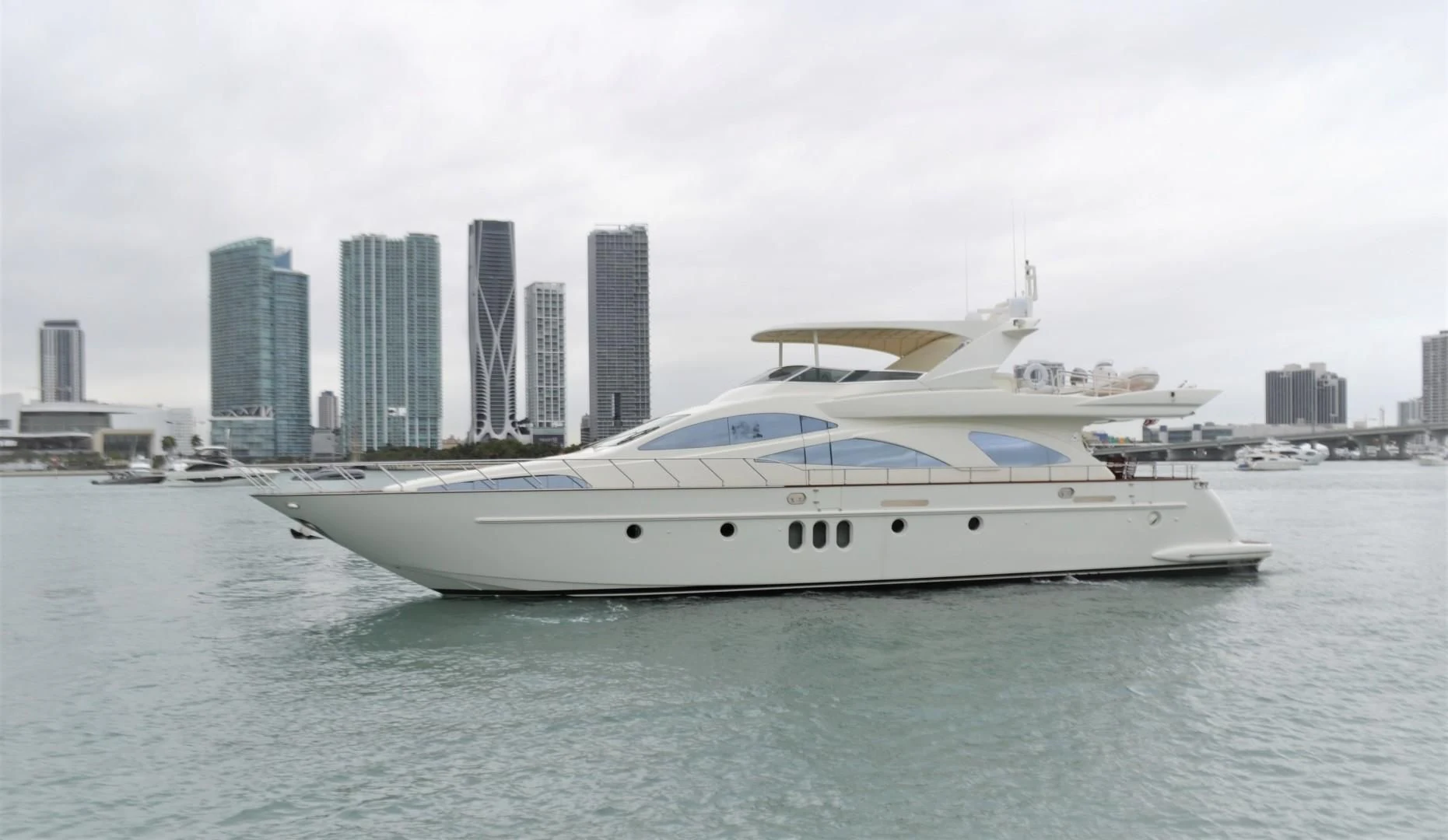 a yacht in the water aboard ENCHANTED LADY Yacht for Sale