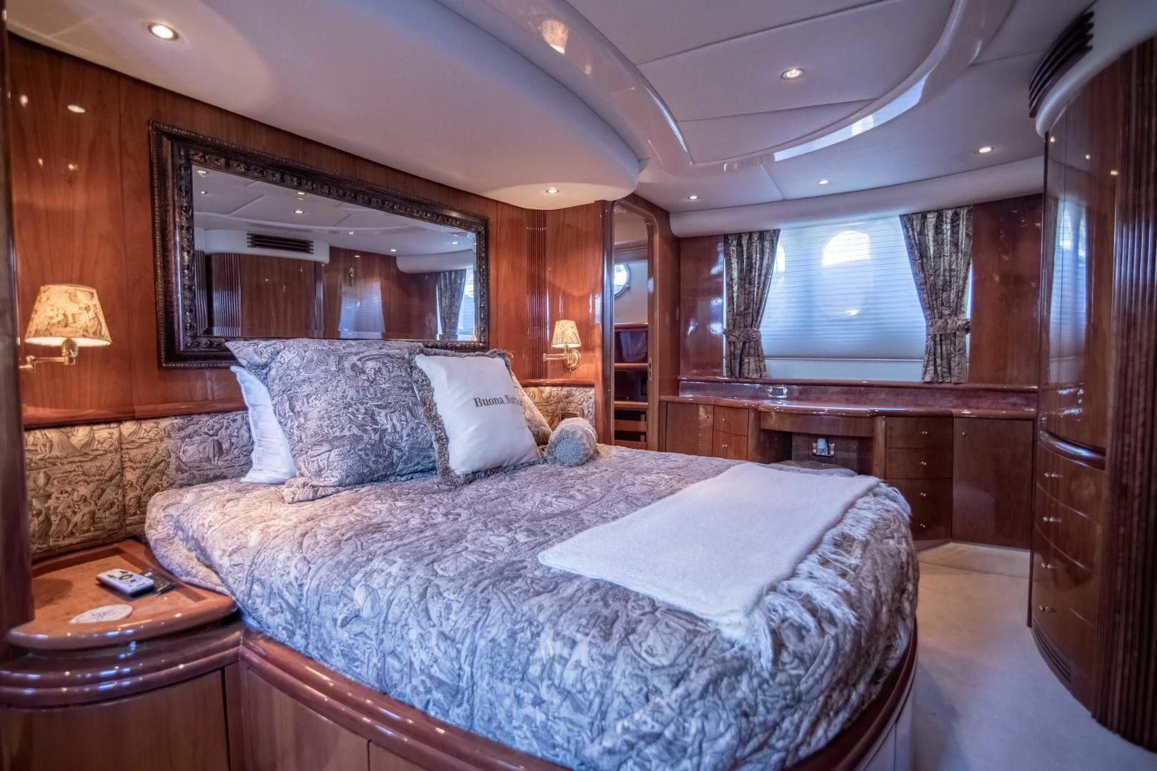 a large bed in a room aboard ENCHANTED LADY Yacht for Sale