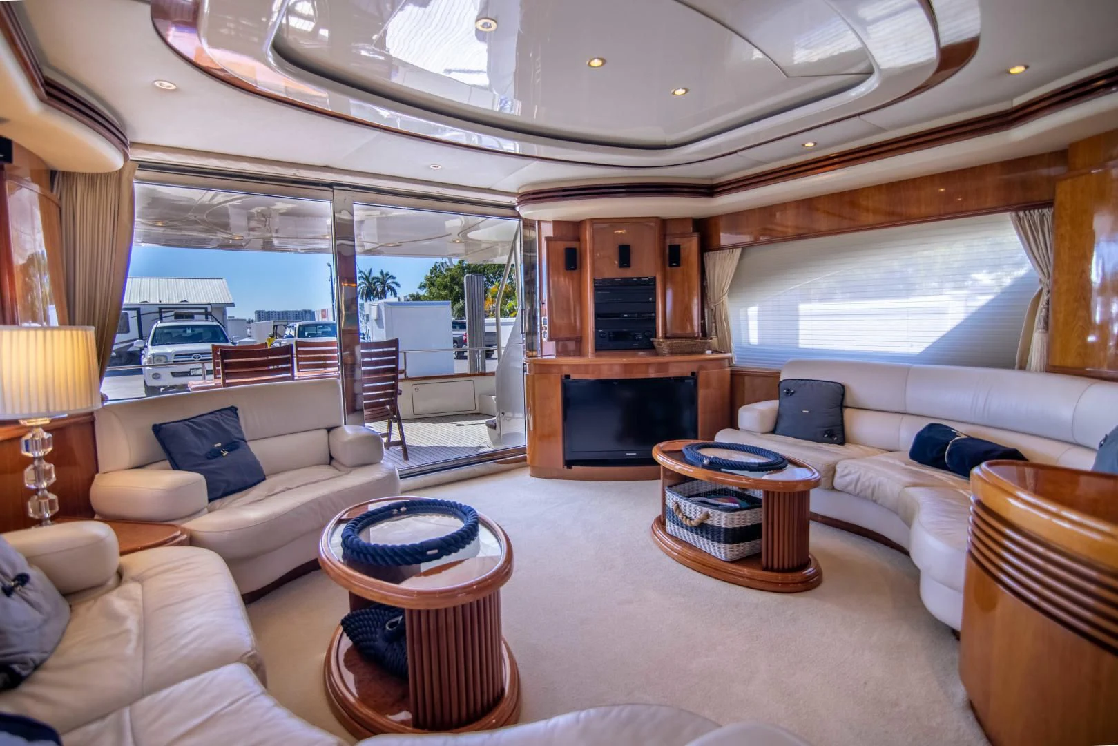 a living room with a fireplace aboard ENCHANTED LADY Yacht for Sale