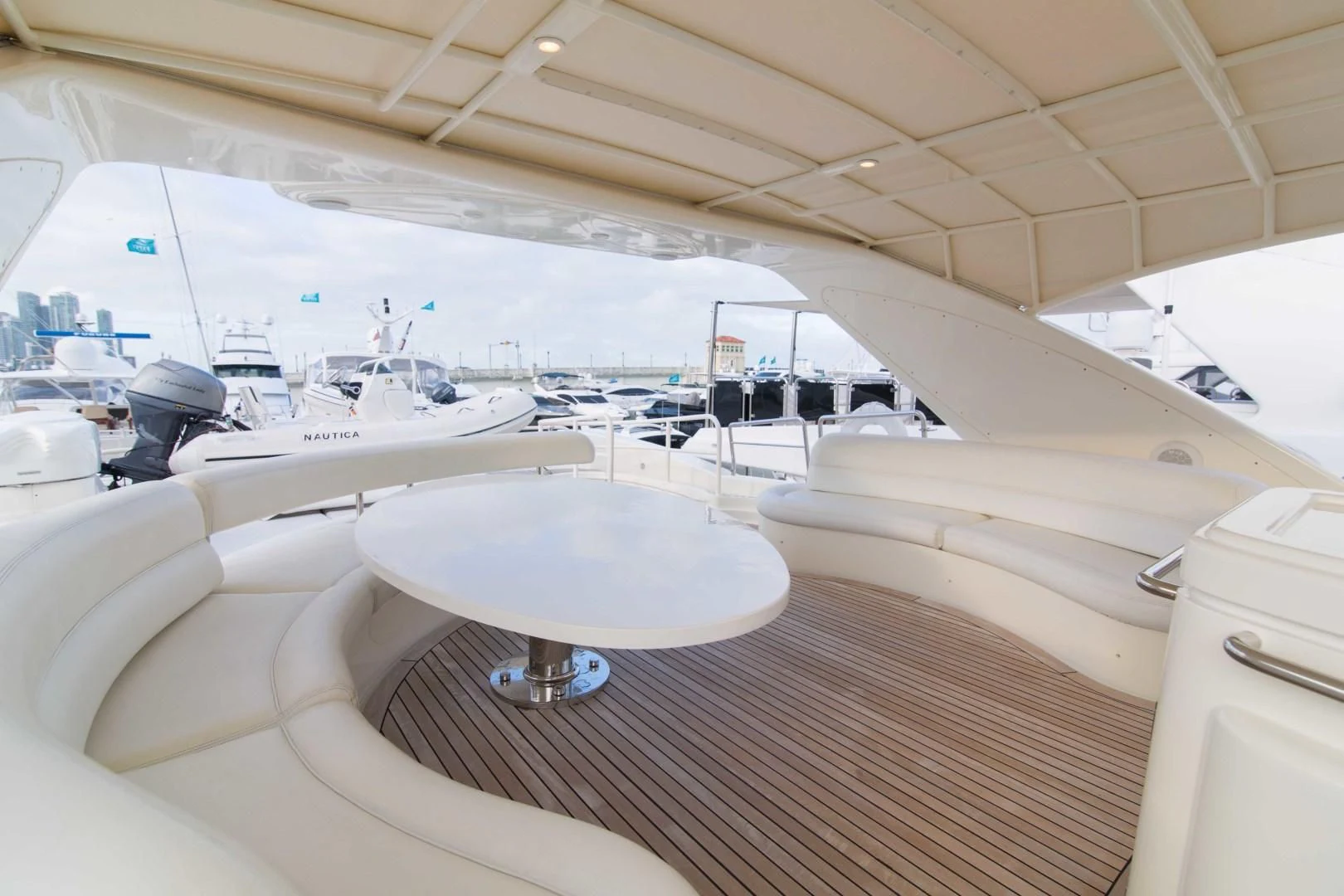 a room with a table and chairs aboard ENCHANTED LADY Yacht for Sale
