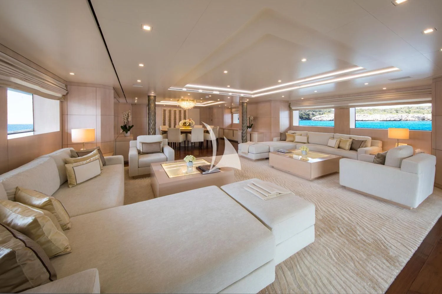 a large living room with a large window aboard ROMA Yacht for Sale