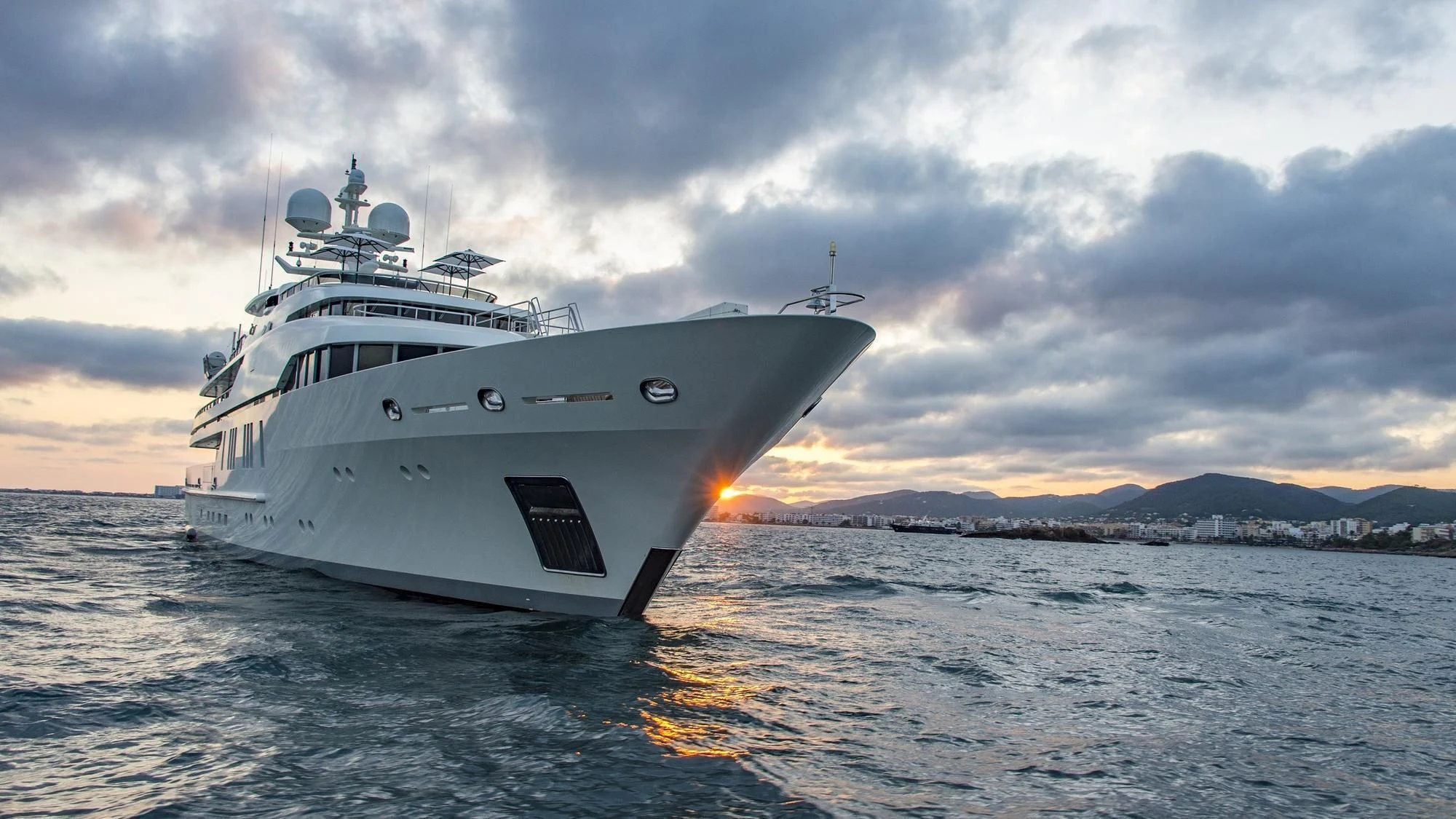 a white yacht in the water aboard ROMA Yacht for Sale