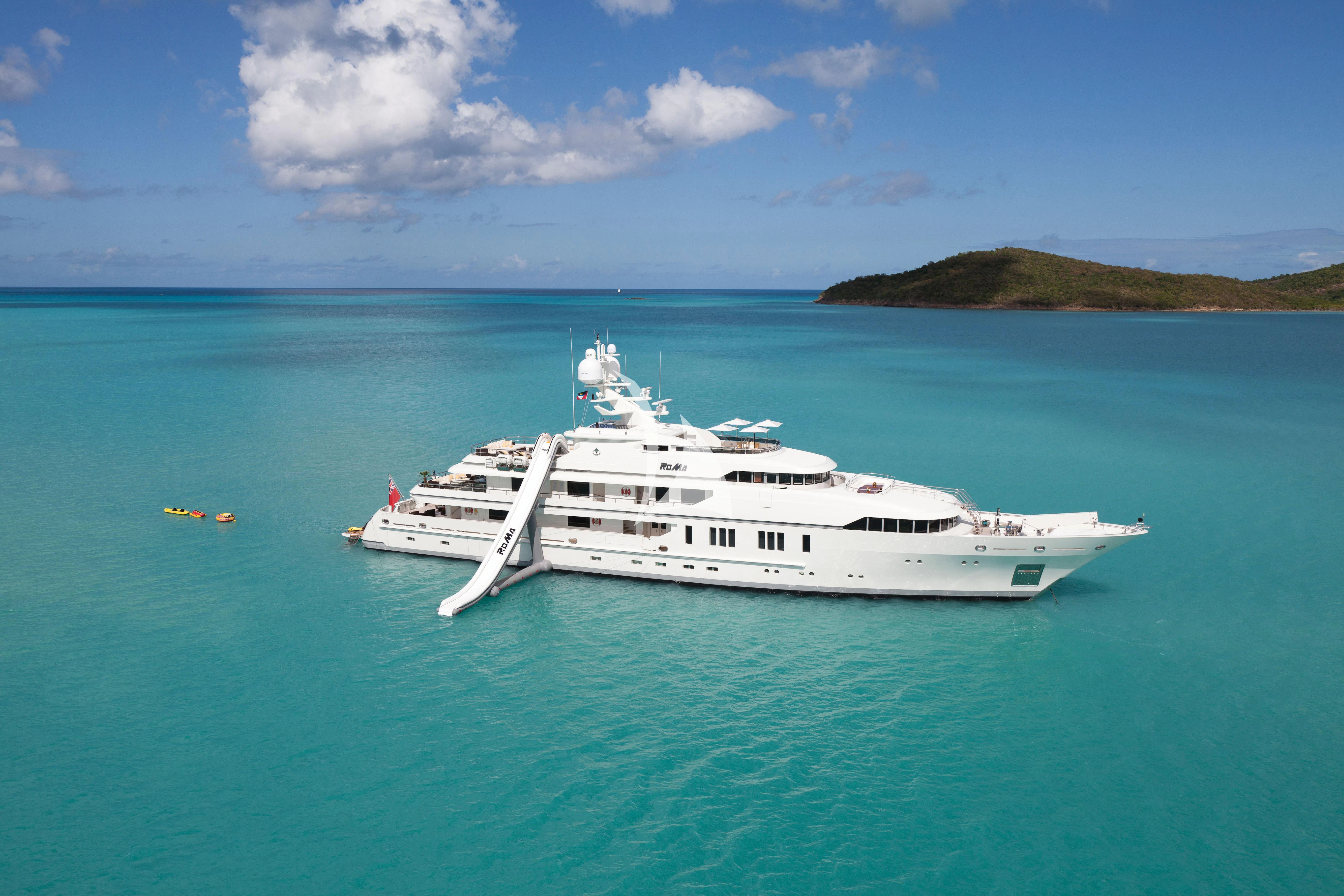 a white boat in the water aboard ROMA Yacht for Sale