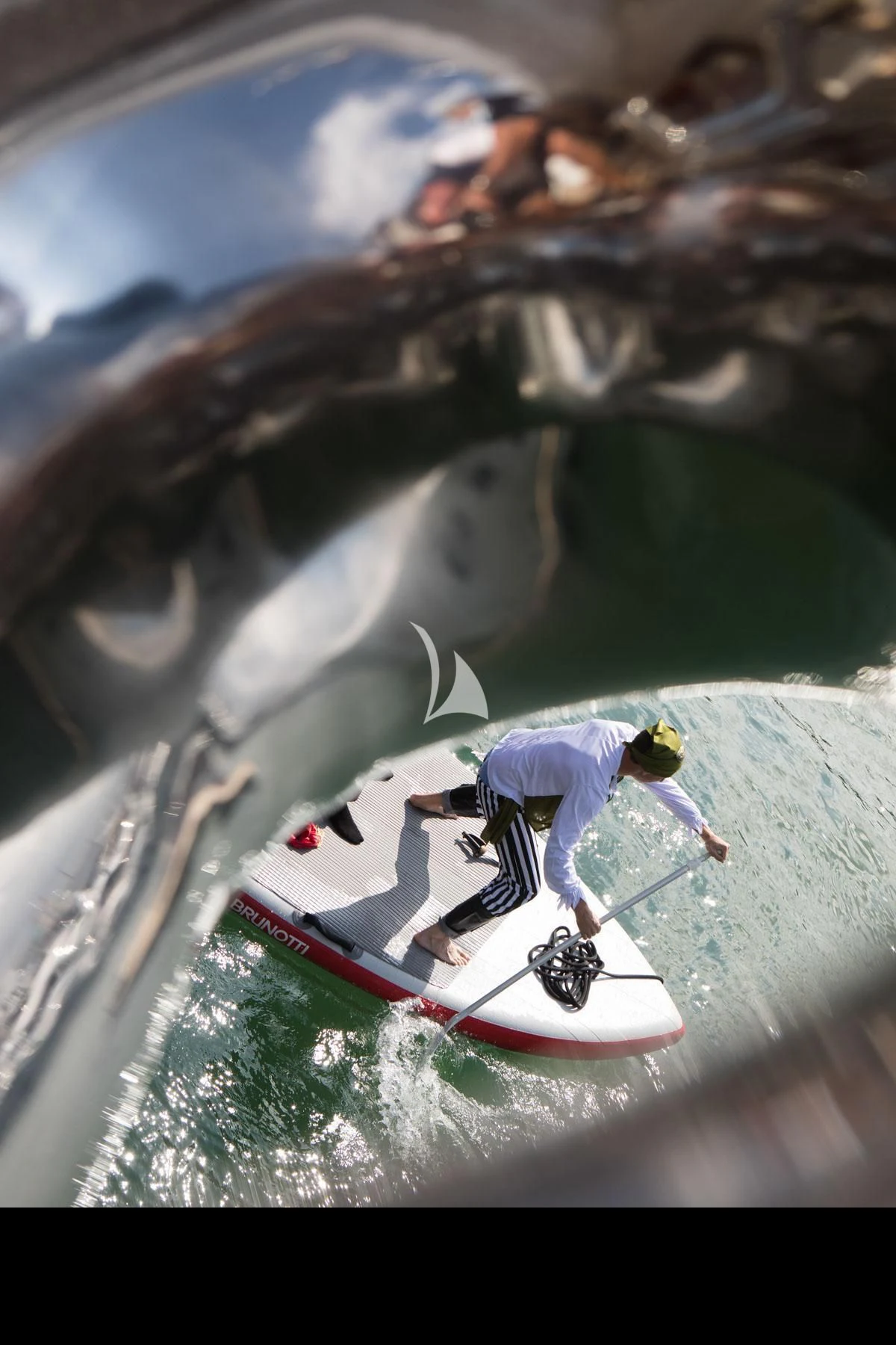 a person surfing in a wave aboard ROMA Yacht for Sale