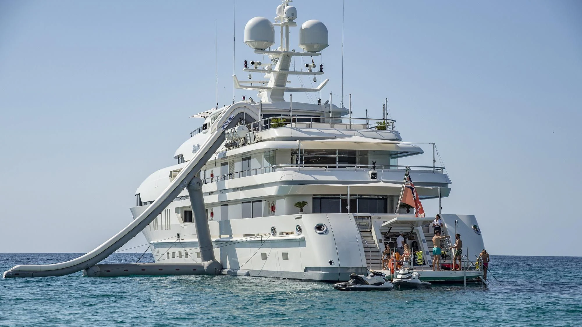 a large white boat with people on it aboard ROMA Yacht for Sale