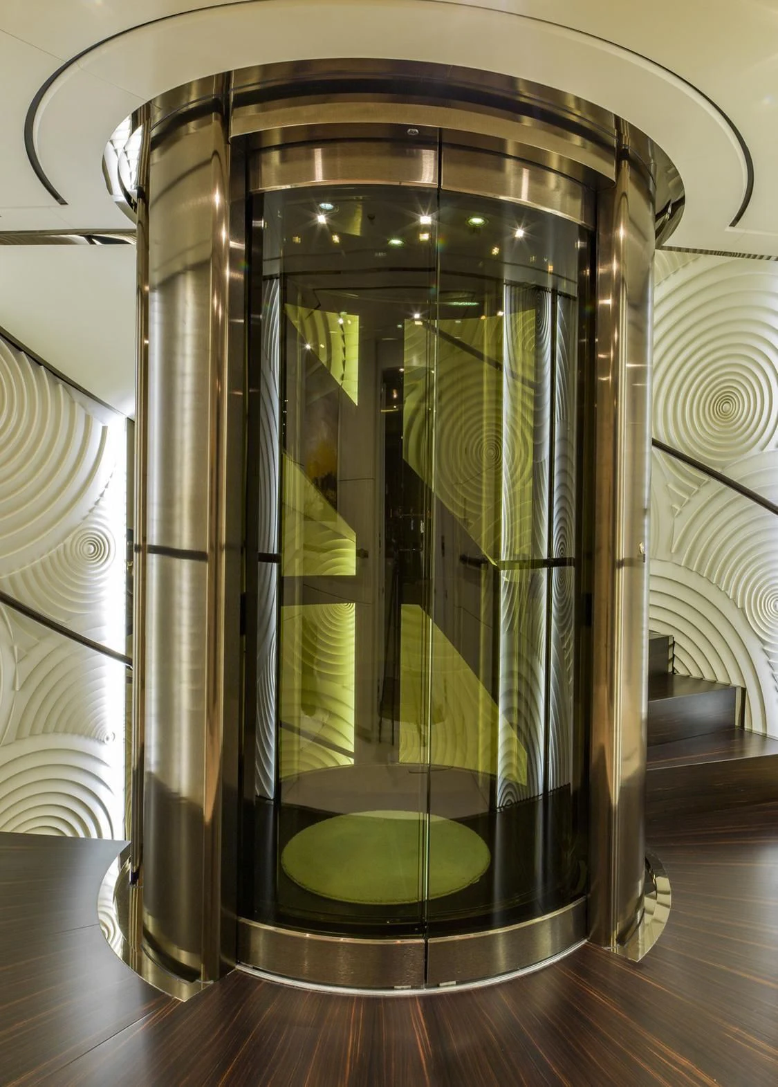 a glass case with a green liquid inside aboard ROMA Yacht for Sale