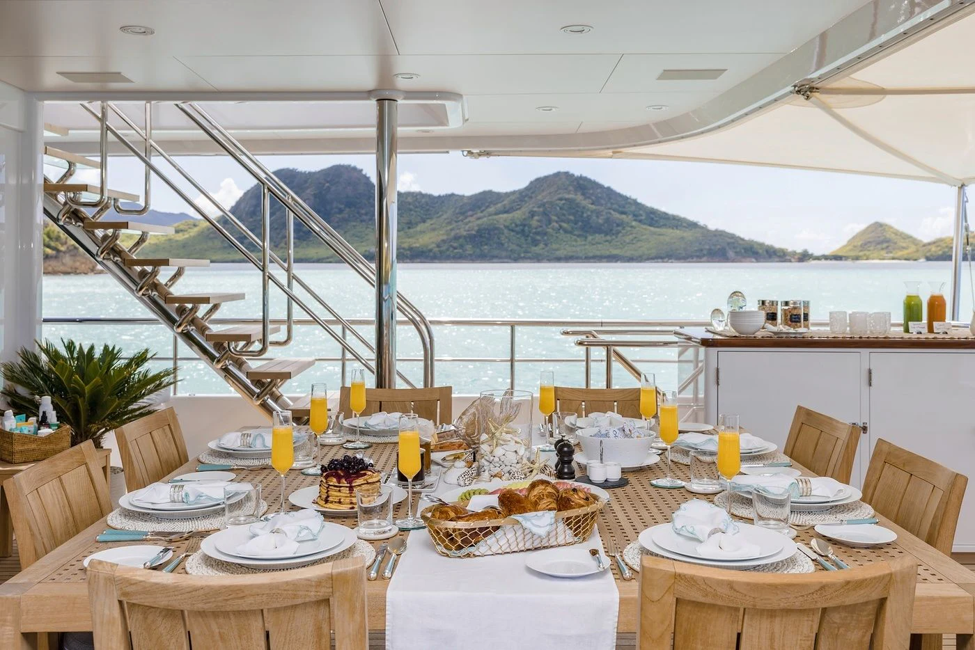 a table set for a meal aboard GLADIATOR Yacht for Sale