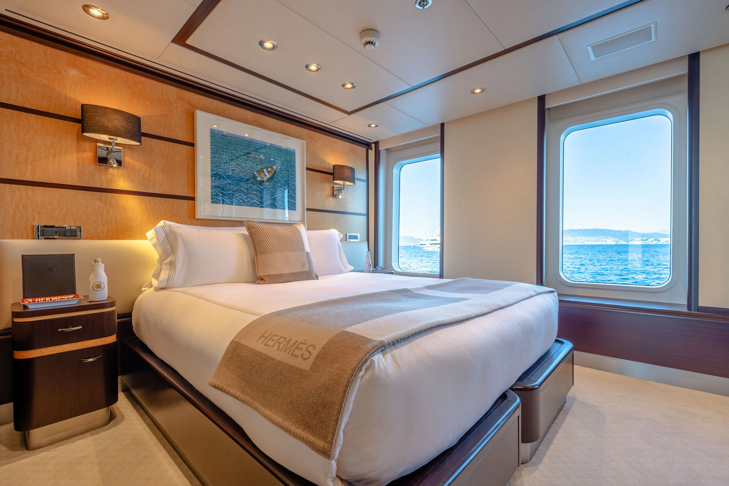 a bed in a room aboard GLADIATOR Yacht for Sale