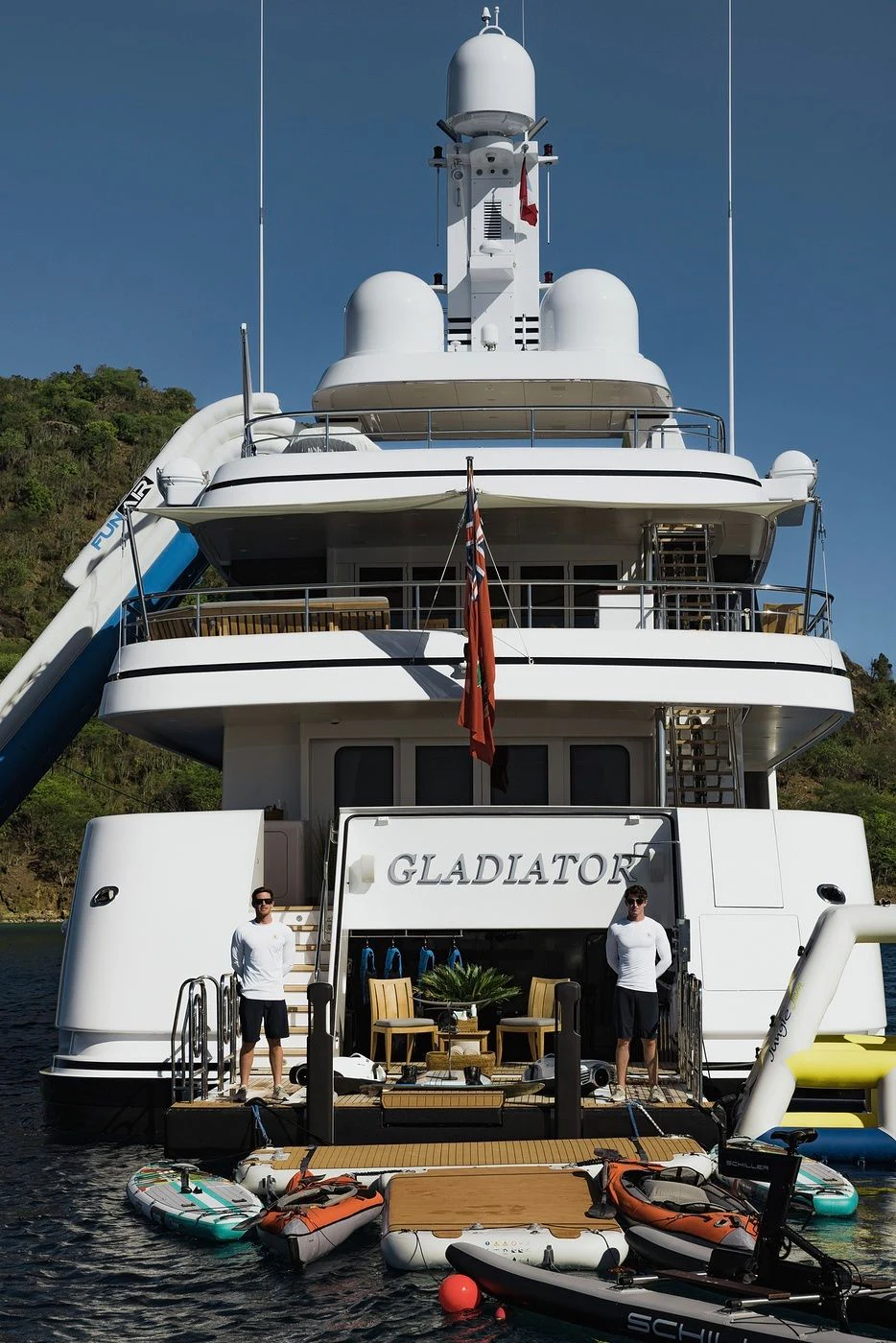 a boat docked at a pier aboard GLADIATOR Yacht for Sale