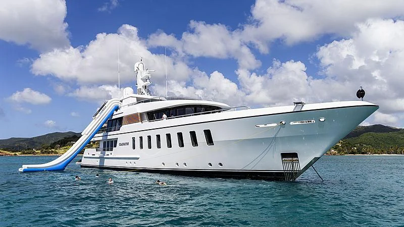 a white yacht in the water aboard GLADIATOR Yacht for Sale