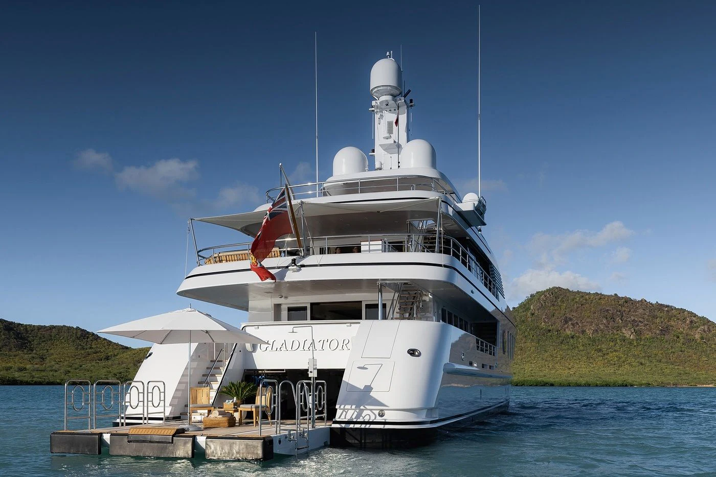 a large white boat in the water aboard GLADIATOR Yacht for Sale