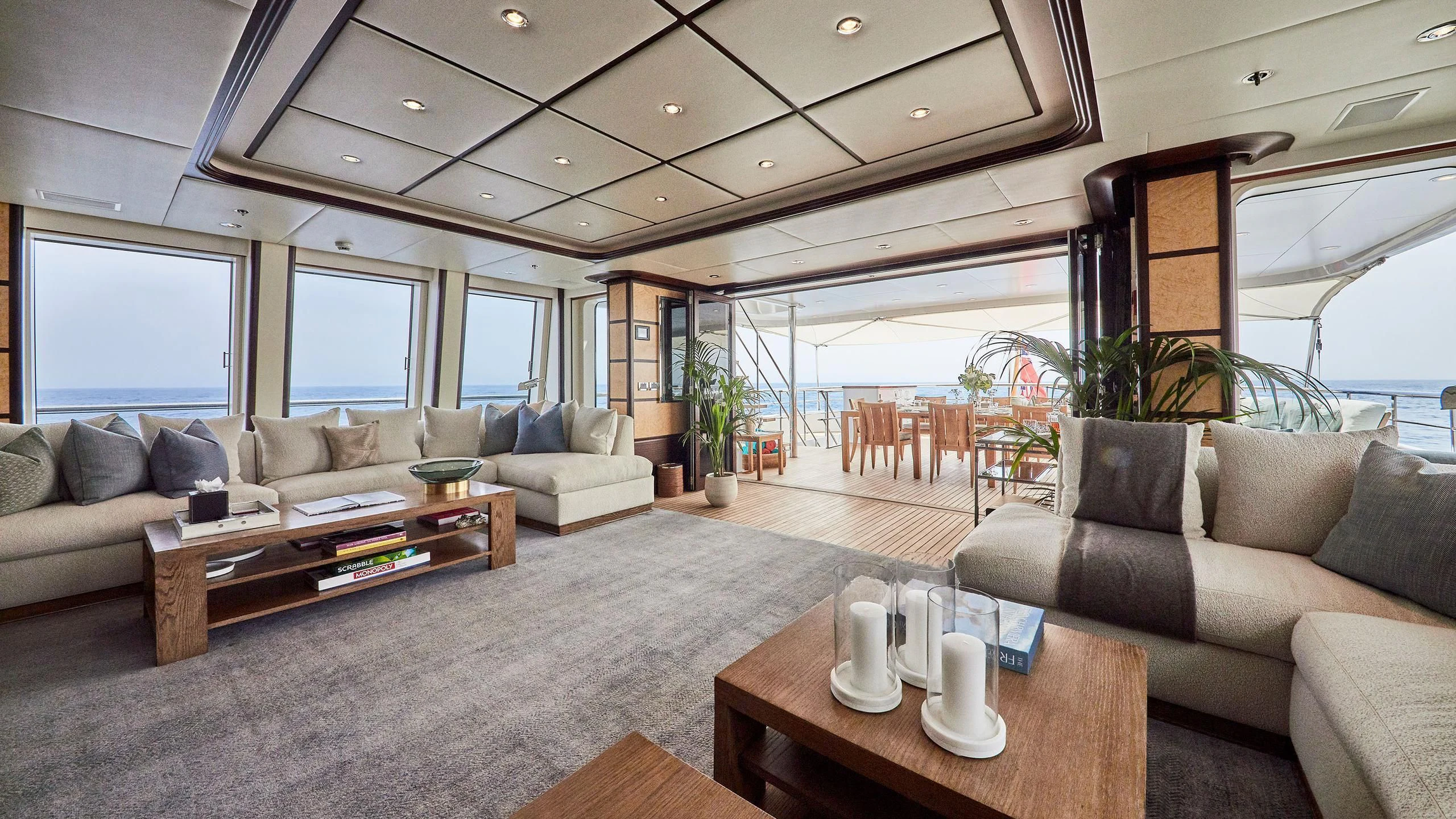 a living room with a large window aboard GLADIATOR Yacht for Sale
