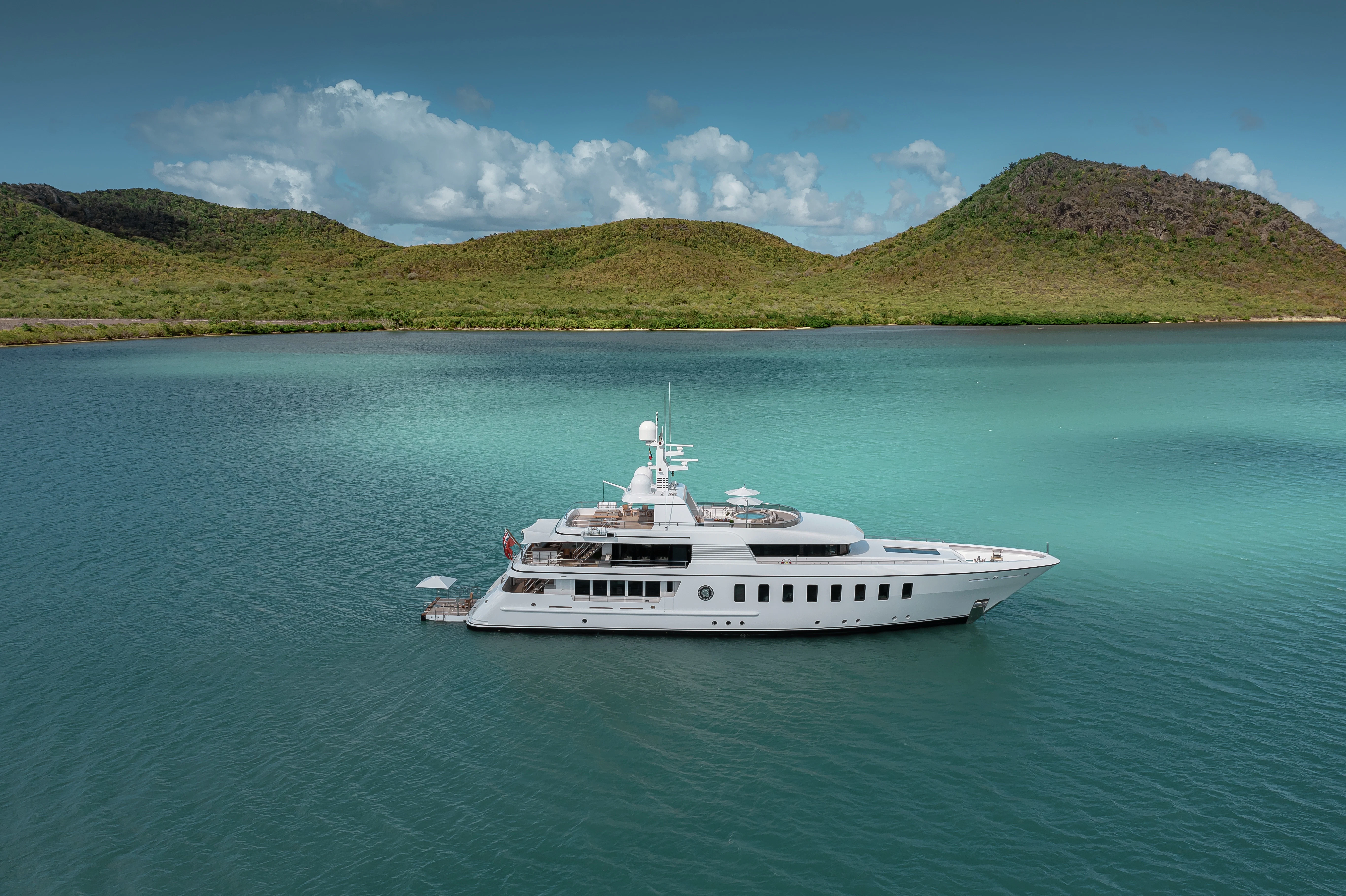 a white boat on water aboard GLADIATOR Yacht for Sale