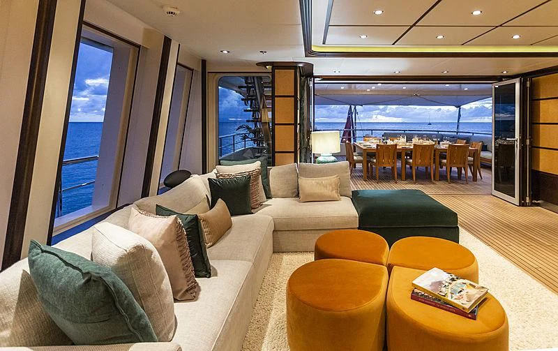 a living room with a large window aboard GLADIATOR Yacht for Sale