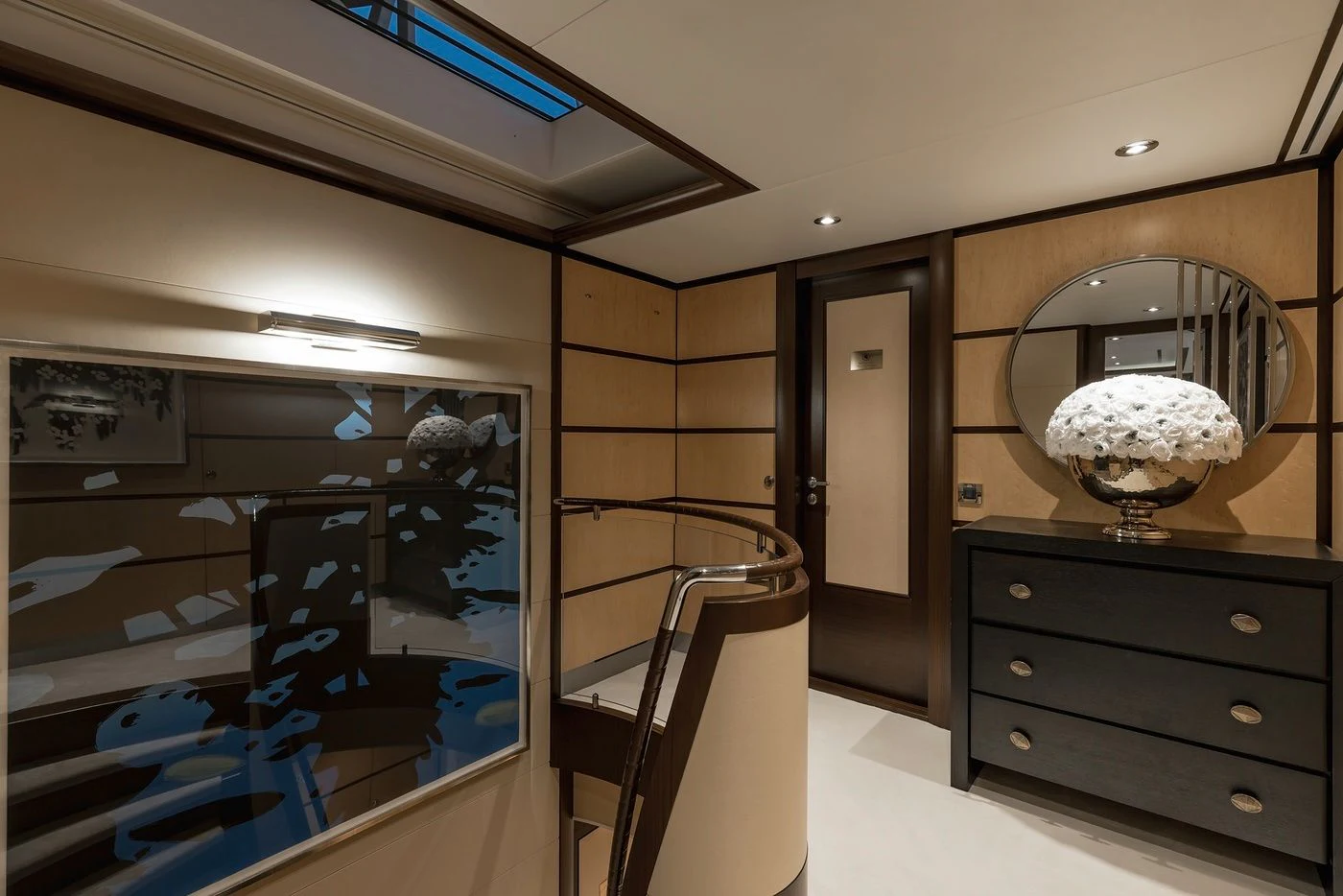a room with a mirror and dresser aboard GLADIATOR Yacht for Sale