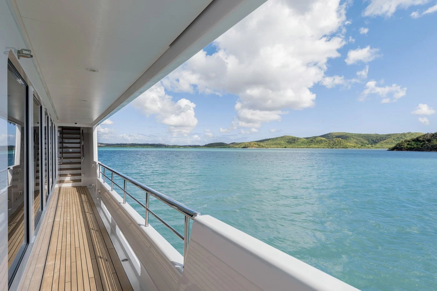 a wooden walkway over water aboard GLADIATOR Yacht for Sale