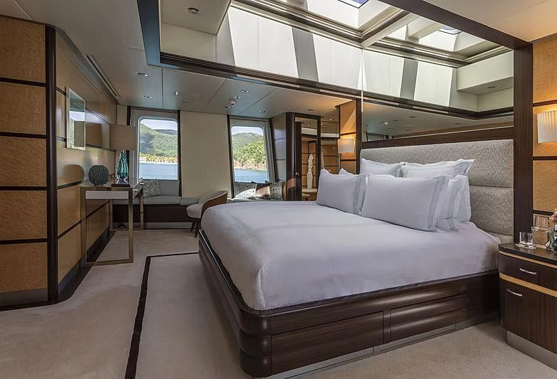 a large bed in a room aboard GLADIATOR Yacht for Sale