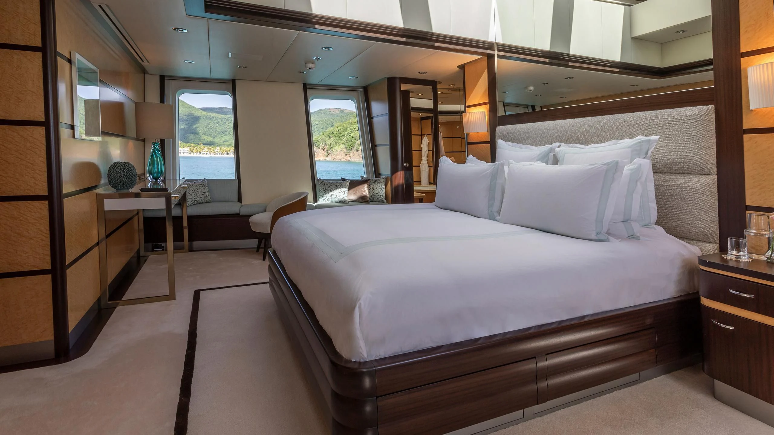 a large bed in a room aboard GLADIATOR Yacht for Sale