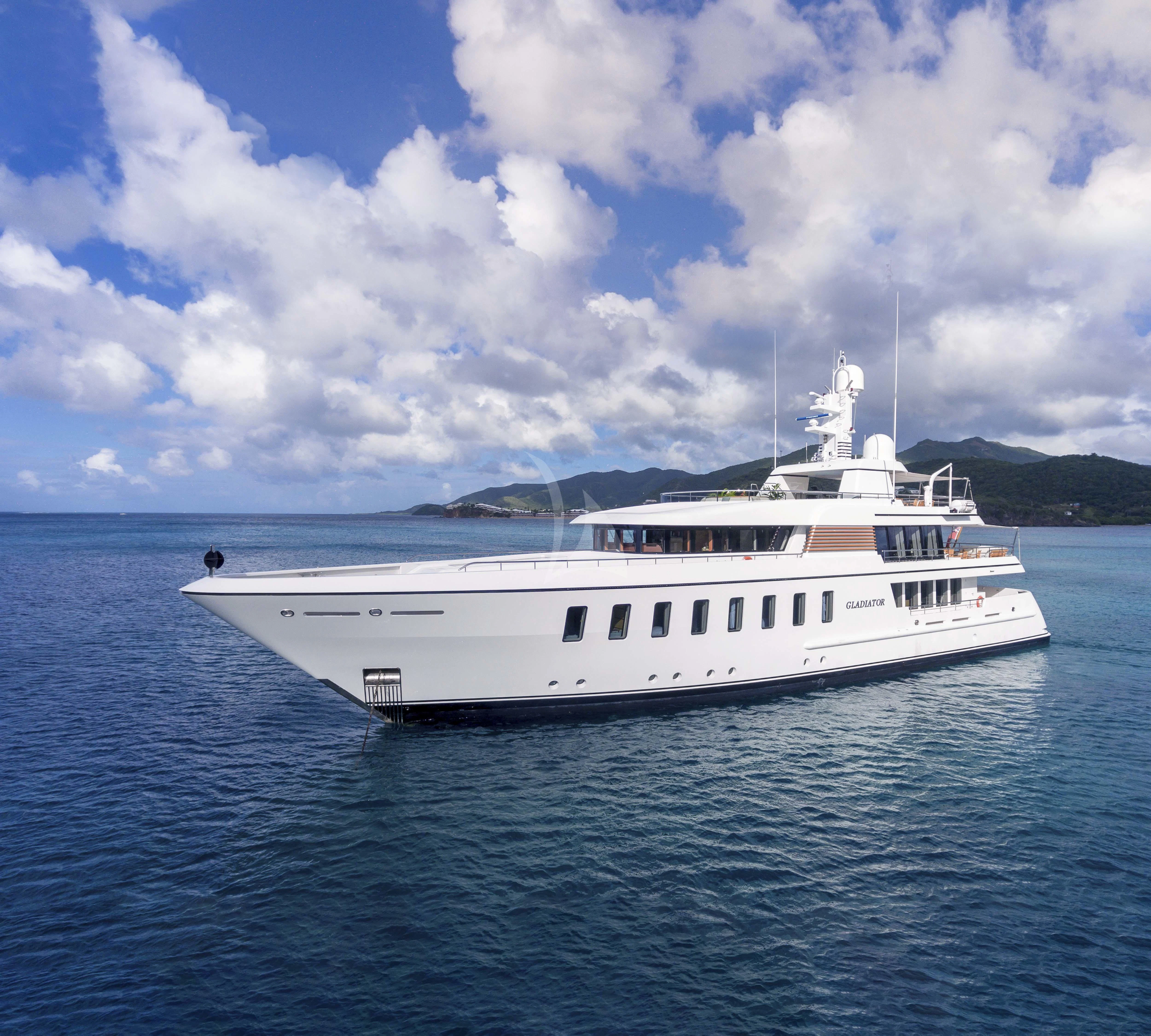 a white yacht in the water aboard GLADIATOR Yacht for Sale