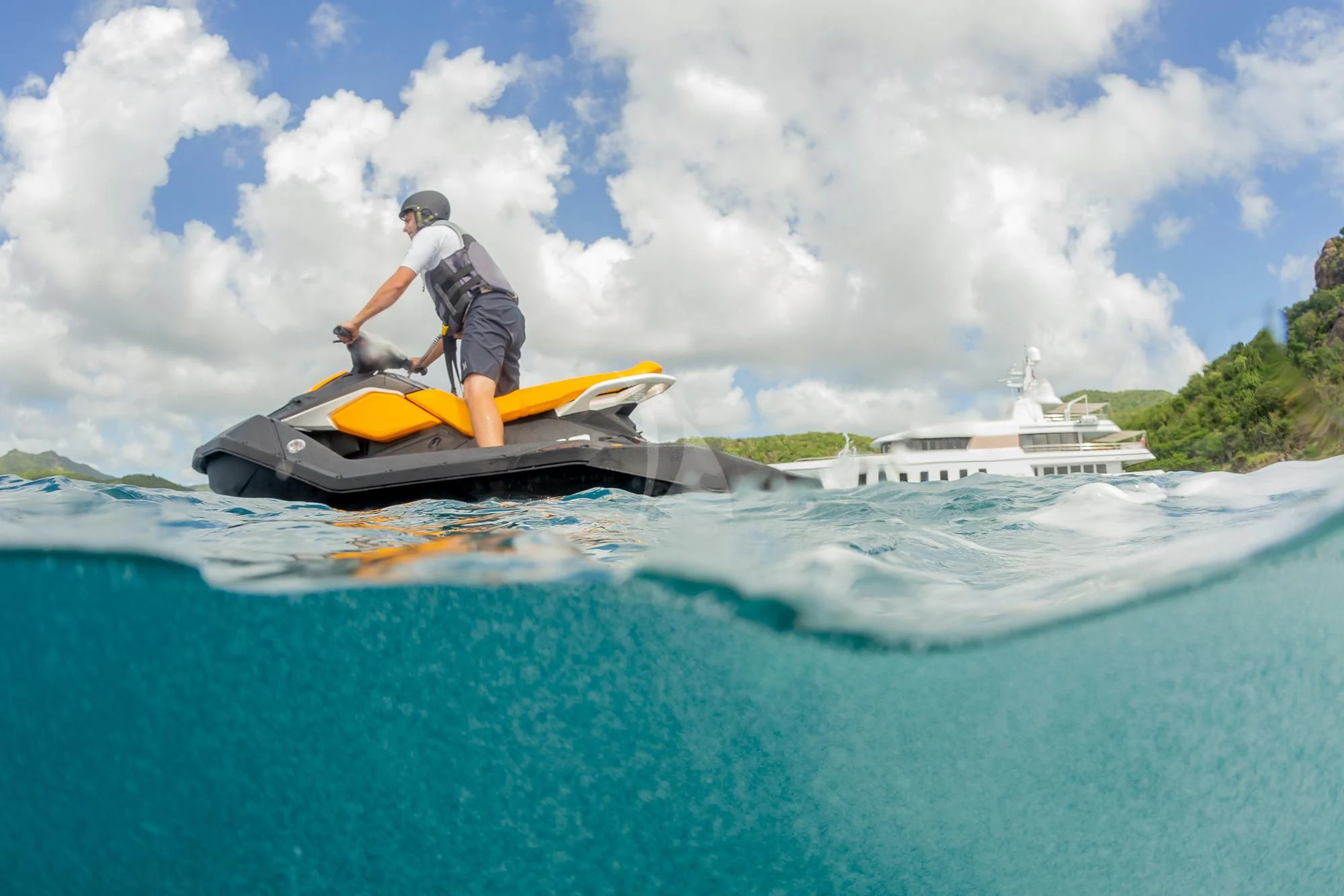 a man on a kayak aboard GLADIATOR Yacht for Sale