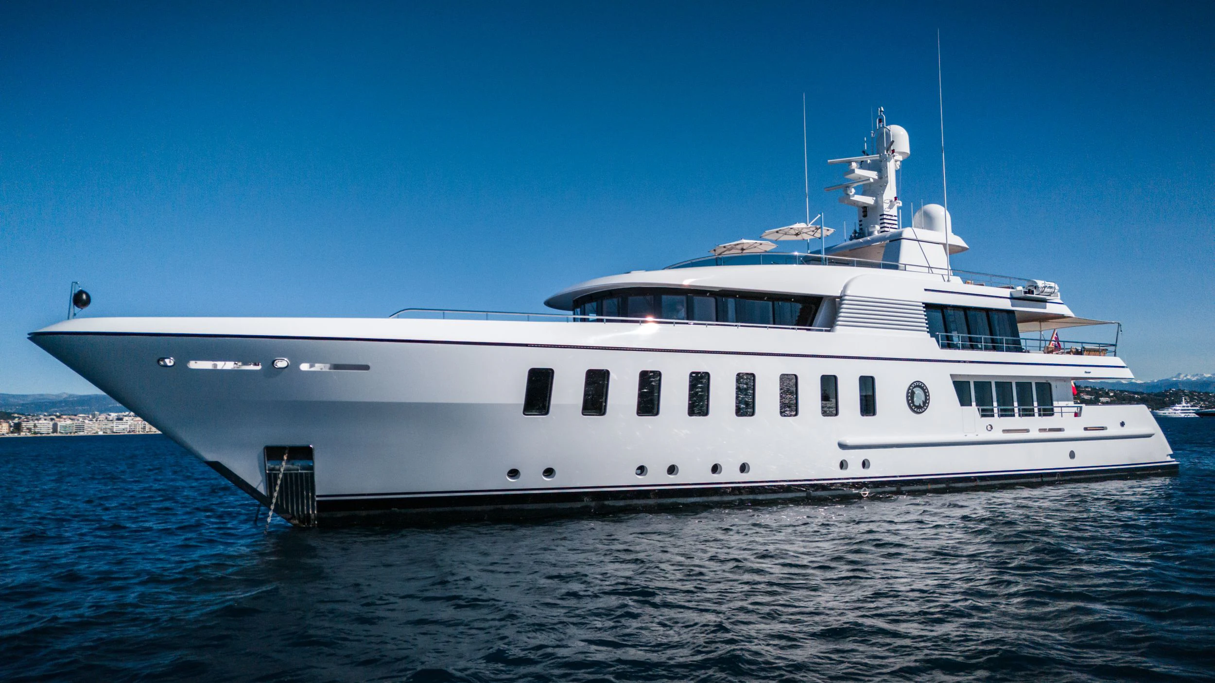 a large white yacht aboard GLADIATOR Yacht for Sale