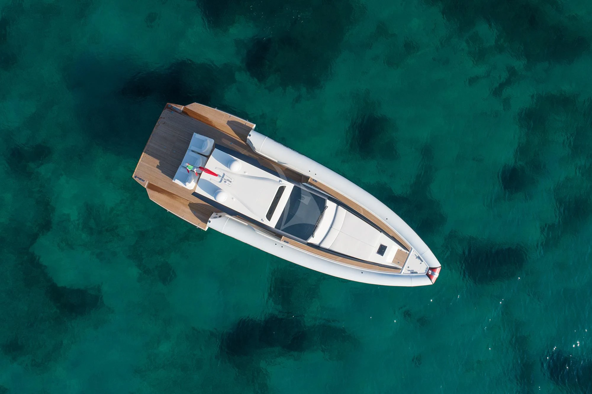 a small boat in the water aboard GLADIATOR Yacht for Sale