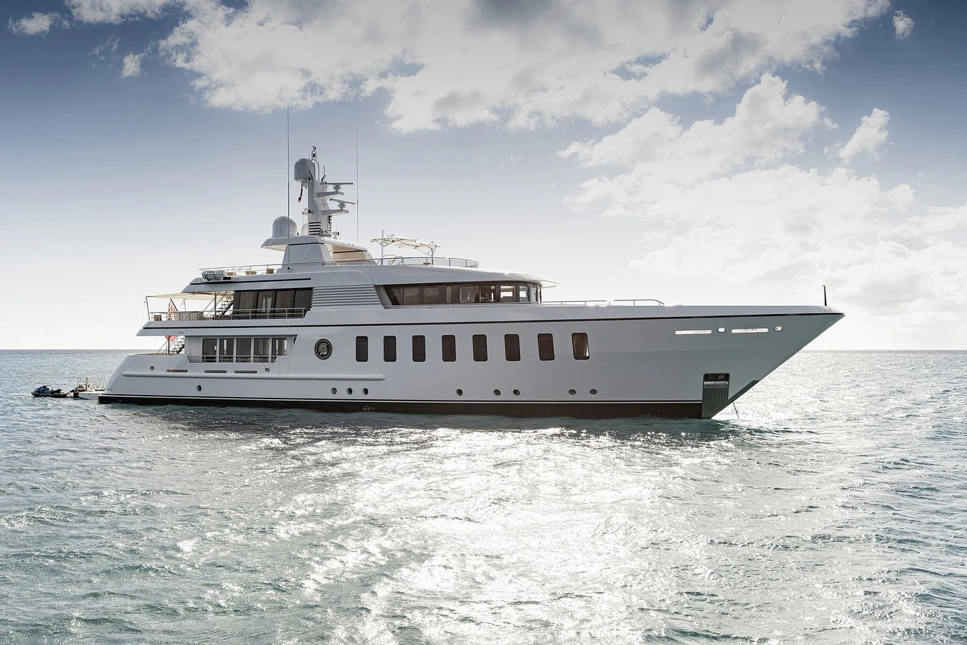 a large white boat in the water aboard GLADIATOR Yacht for Sale