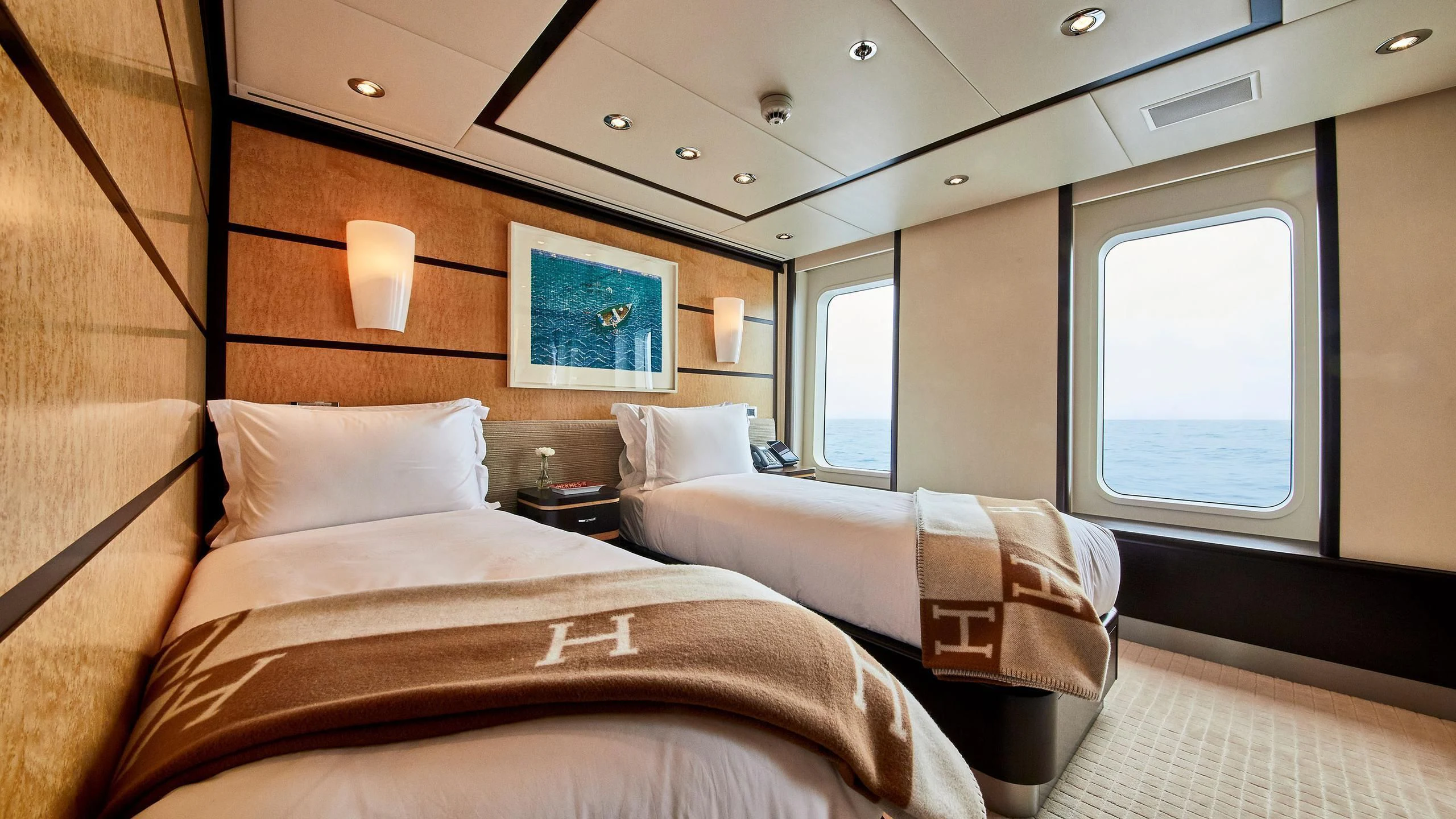 a room with two beds aboard GLADIATOR Yacht for Sale