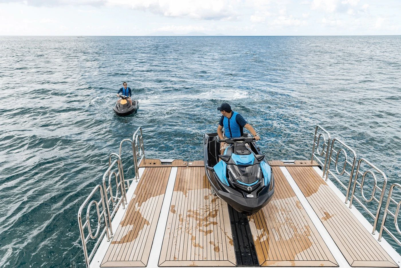 a couple of people in a boat aboard GLADIATOR Yacht for Sale