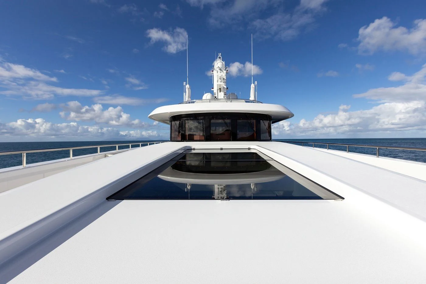 a white boat on a bridge aboard GLADIATOR Yacht for Sale