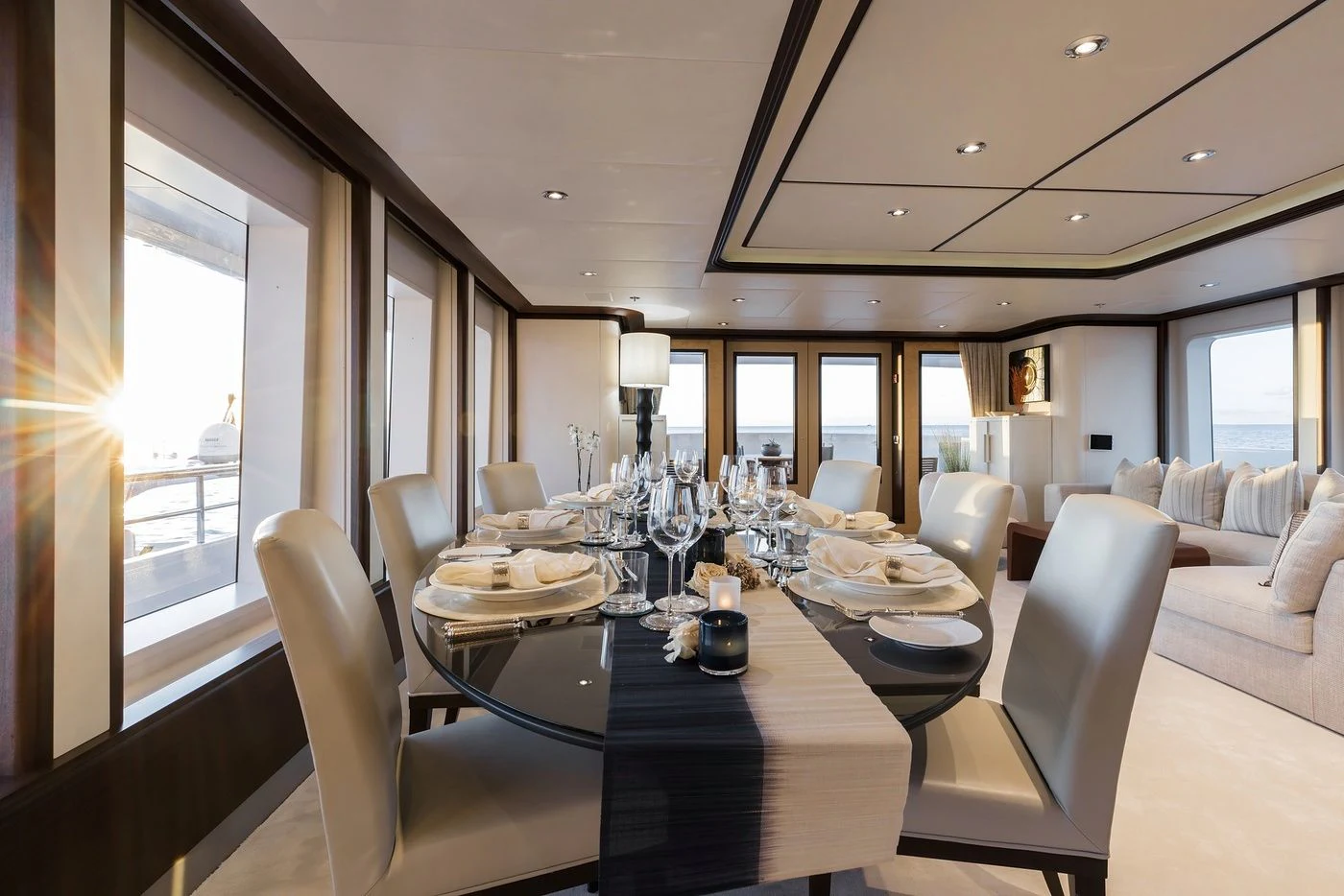 a large dining room with a large table and chairs aboard GLADIATOR Yacht for Sale