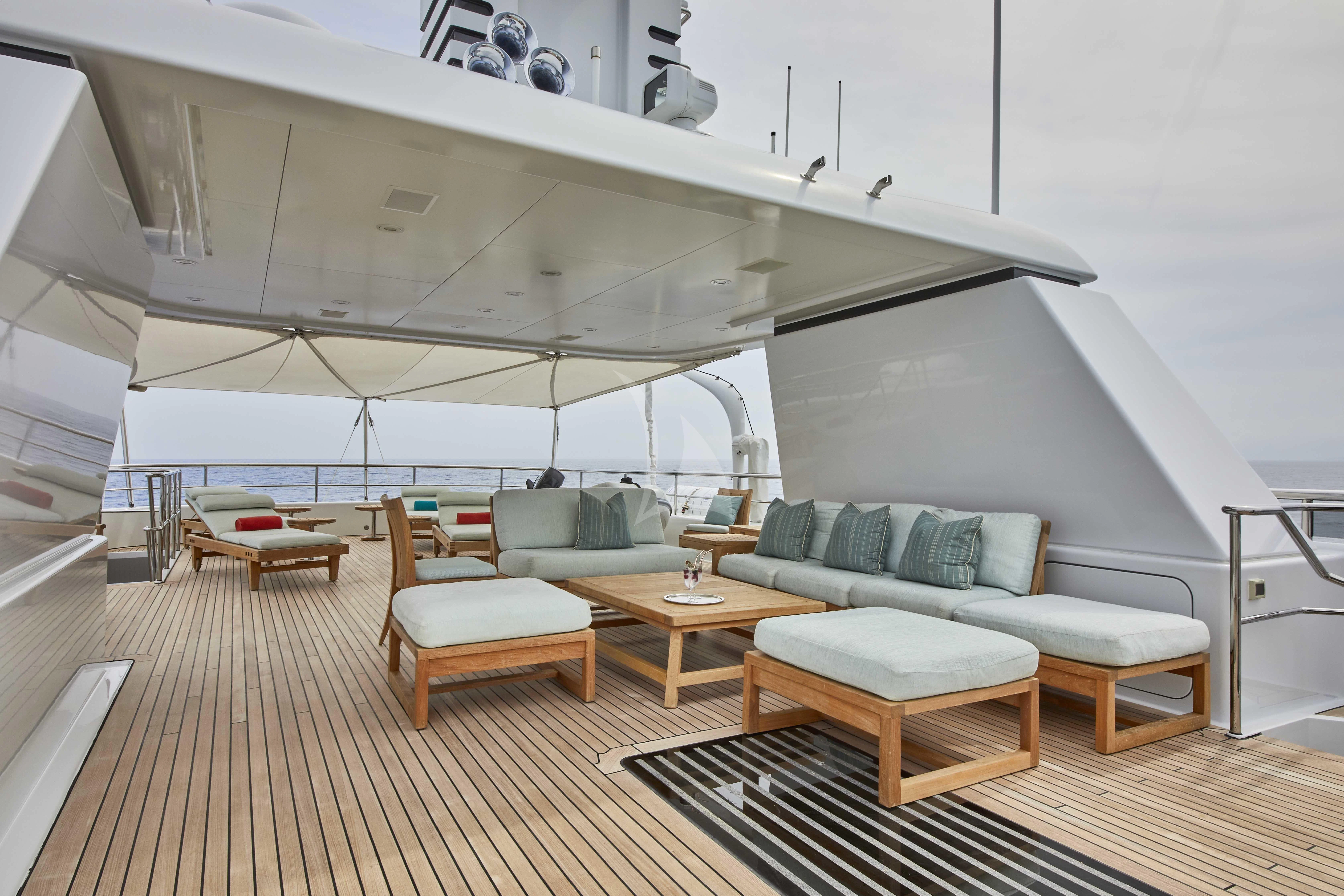 a large living room with a large window aboard GLADIATOR Yacht for Sale
