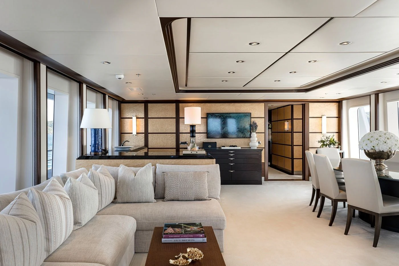 a living room with a large fireplace aboard GLADIATOR Yacht for Sale