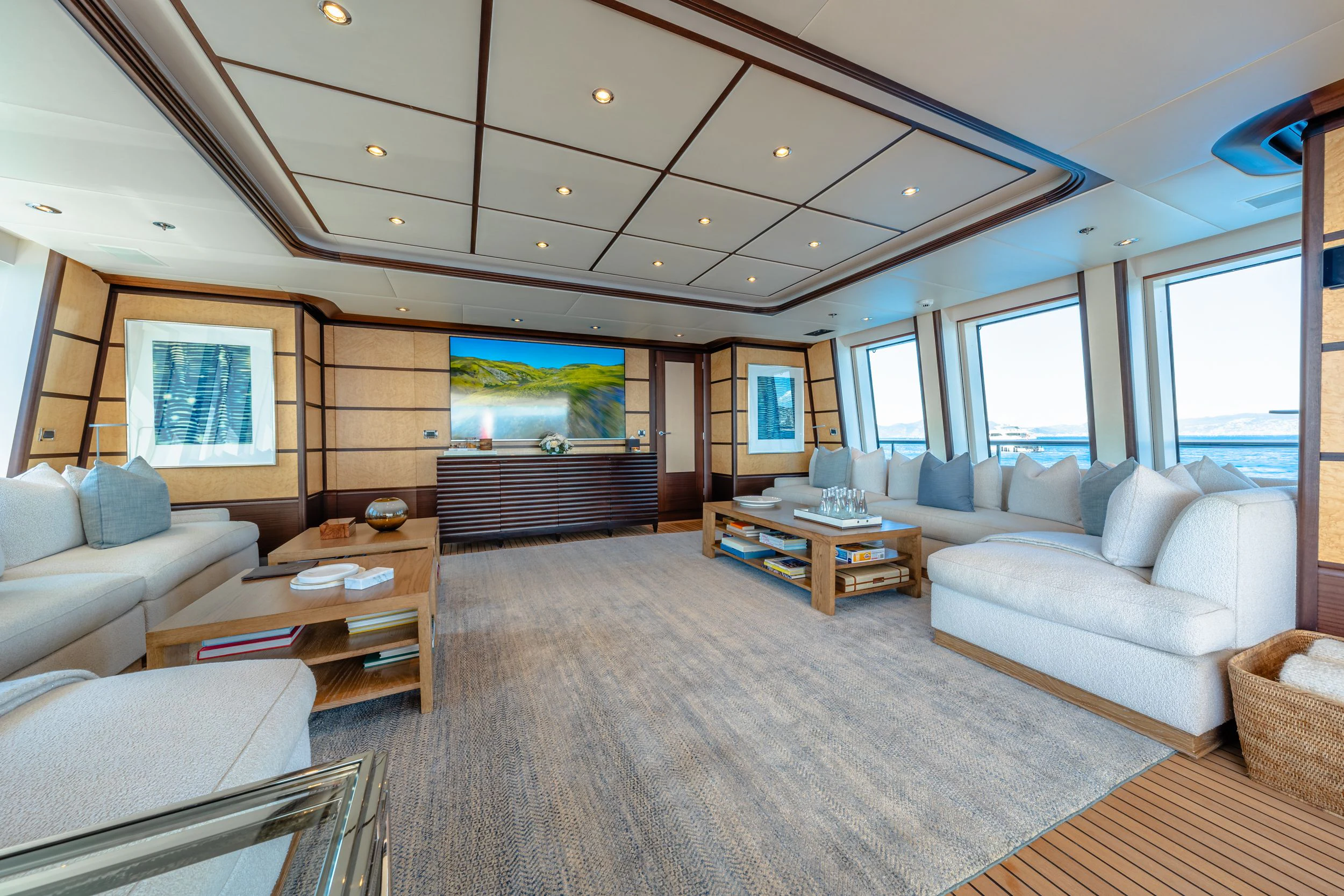 a living room with a large ceiling aboard GLADIATOR Yacht for Sale