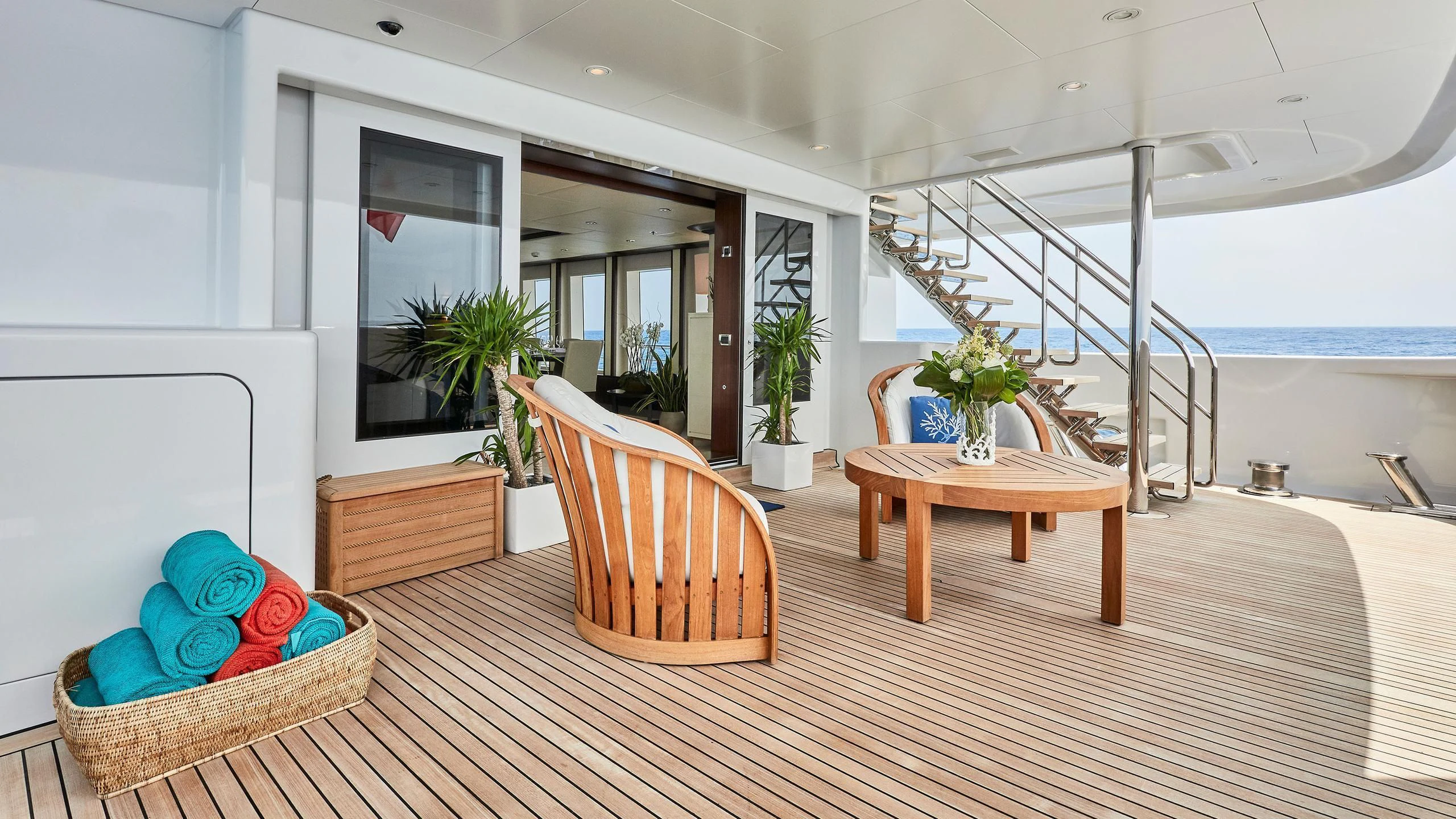 a room with a table and chairs aboard GLADIATOR Yacht for Sale