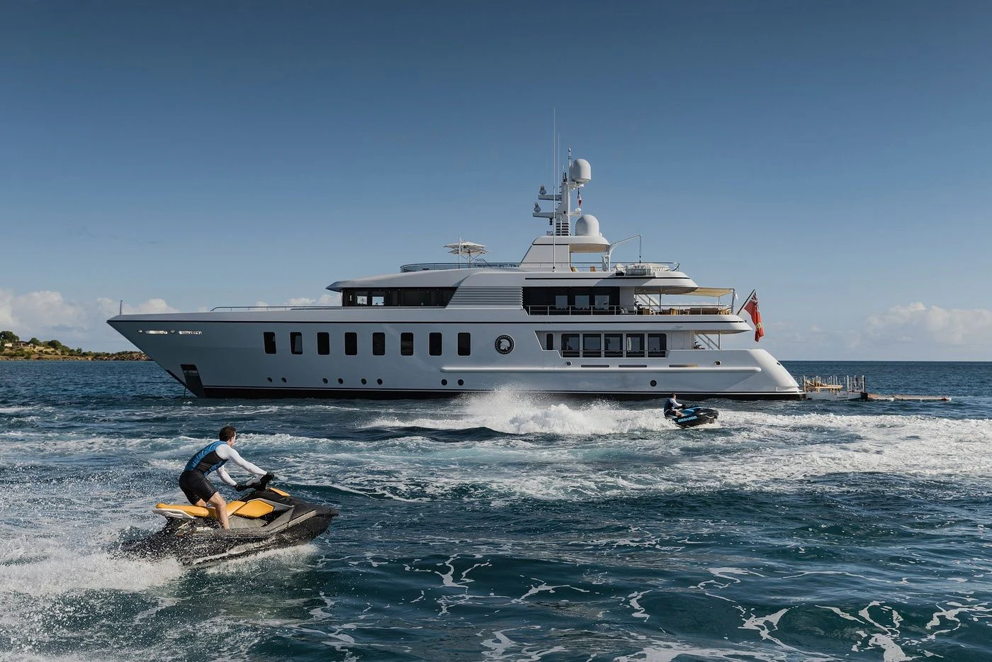 a large white ship with a person in it aboard GLADIATOR Yacht for Sale
