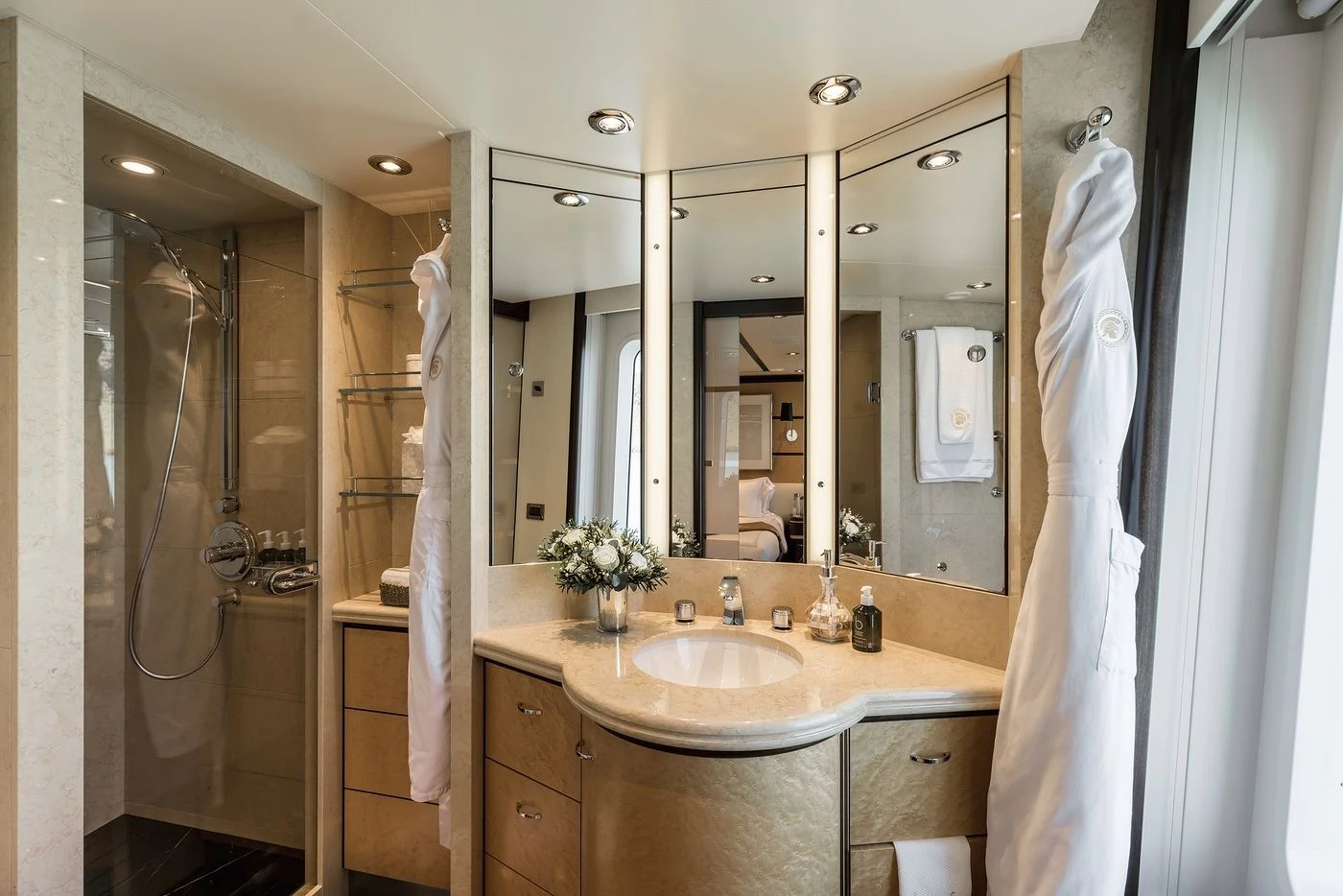 a bathroom with a large mirror aboard GLADIATOR Yacht for Sale
