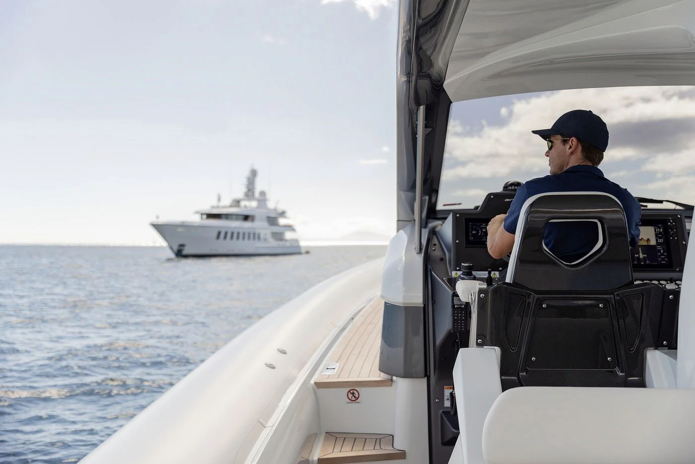 a man on a boat aboard GLADIATOR Yacht for Sale