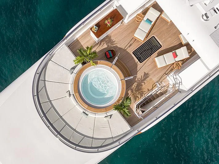 a circular building with a round pool aboard GLADIATOR Yacht for Sale