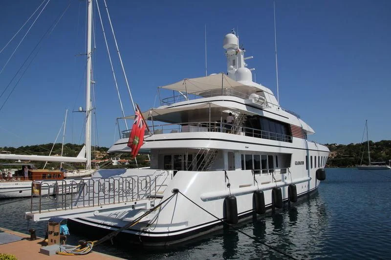a large white boat in the water aboard GLADIATOR Yacht for Sale