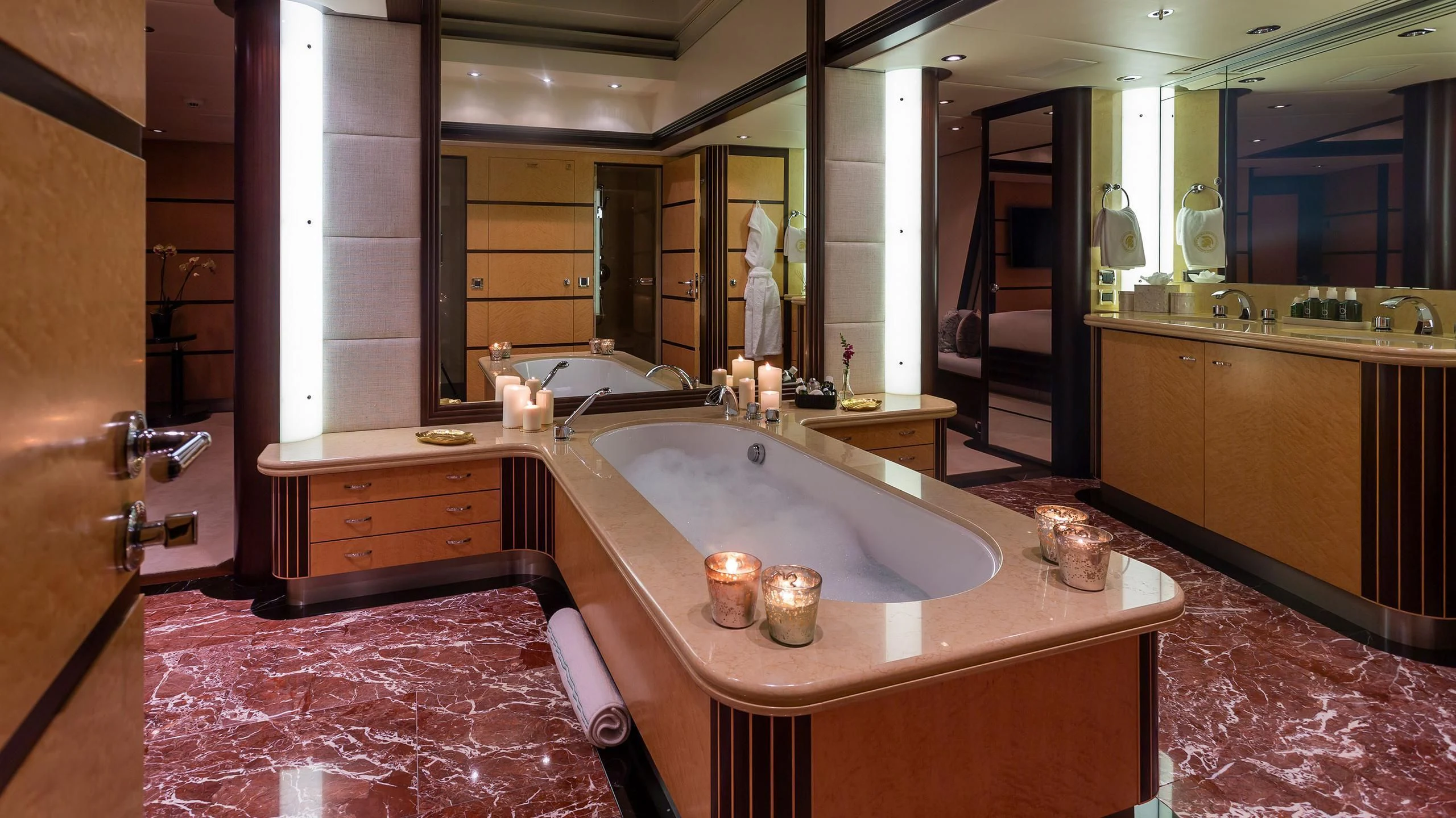 a large bathroom with a large sink aboard GLADIATOR Yacht for Sale