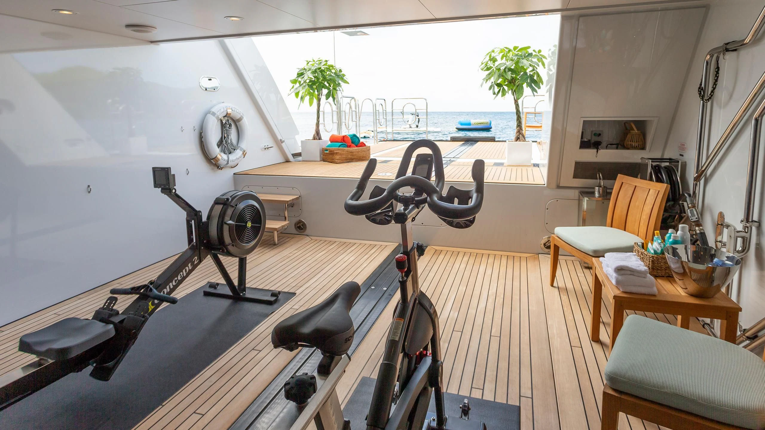 a room with a table and chairs aboard GLADIATOR Yacht for Sale