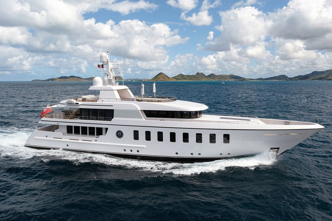 a white yacht in the water aboard GLADIATOR Yacht for Sale