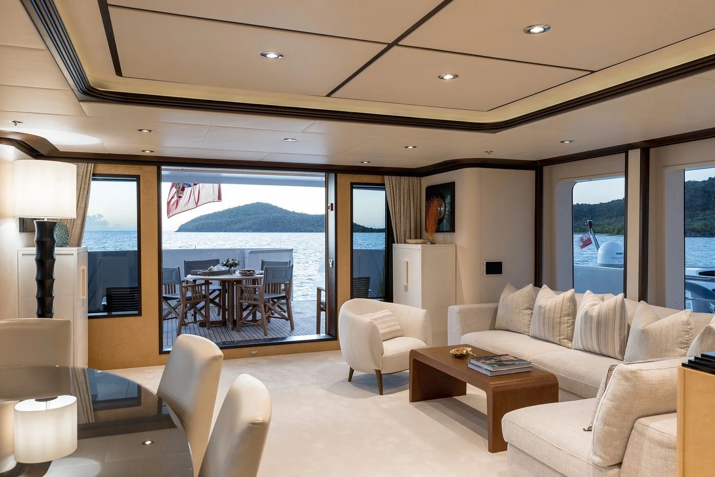 a living room with a large window aboard GLADIATOR Yacht for Sale