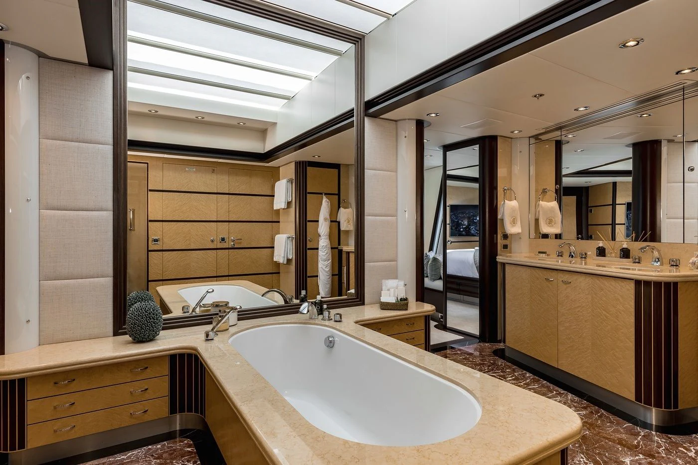 a large bathroom with a large bathtub aboard GLADIATOR Yacht for Sale