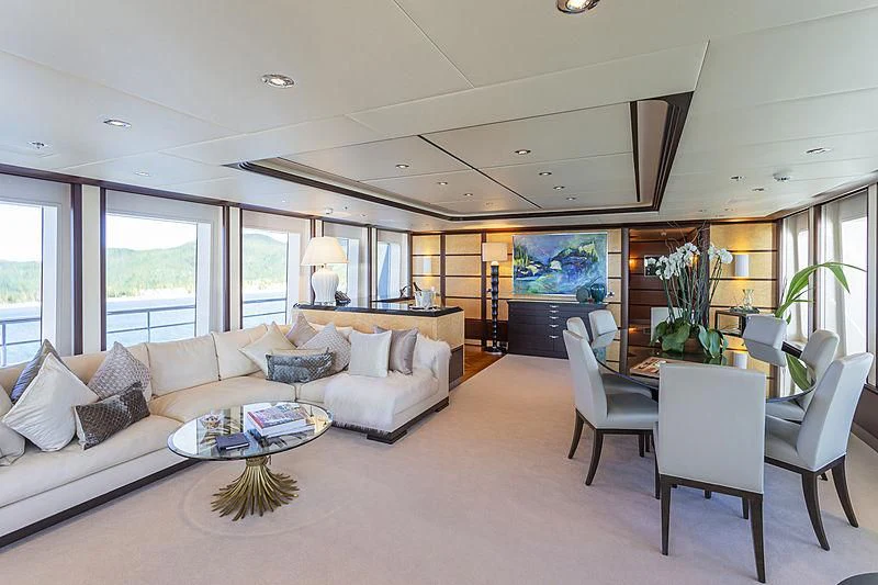 a living room with a large window aboard GLADIATOR Yacht for Sale