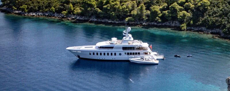 a boat sailing on the water aboard GLADIATOR Yacht for Sale