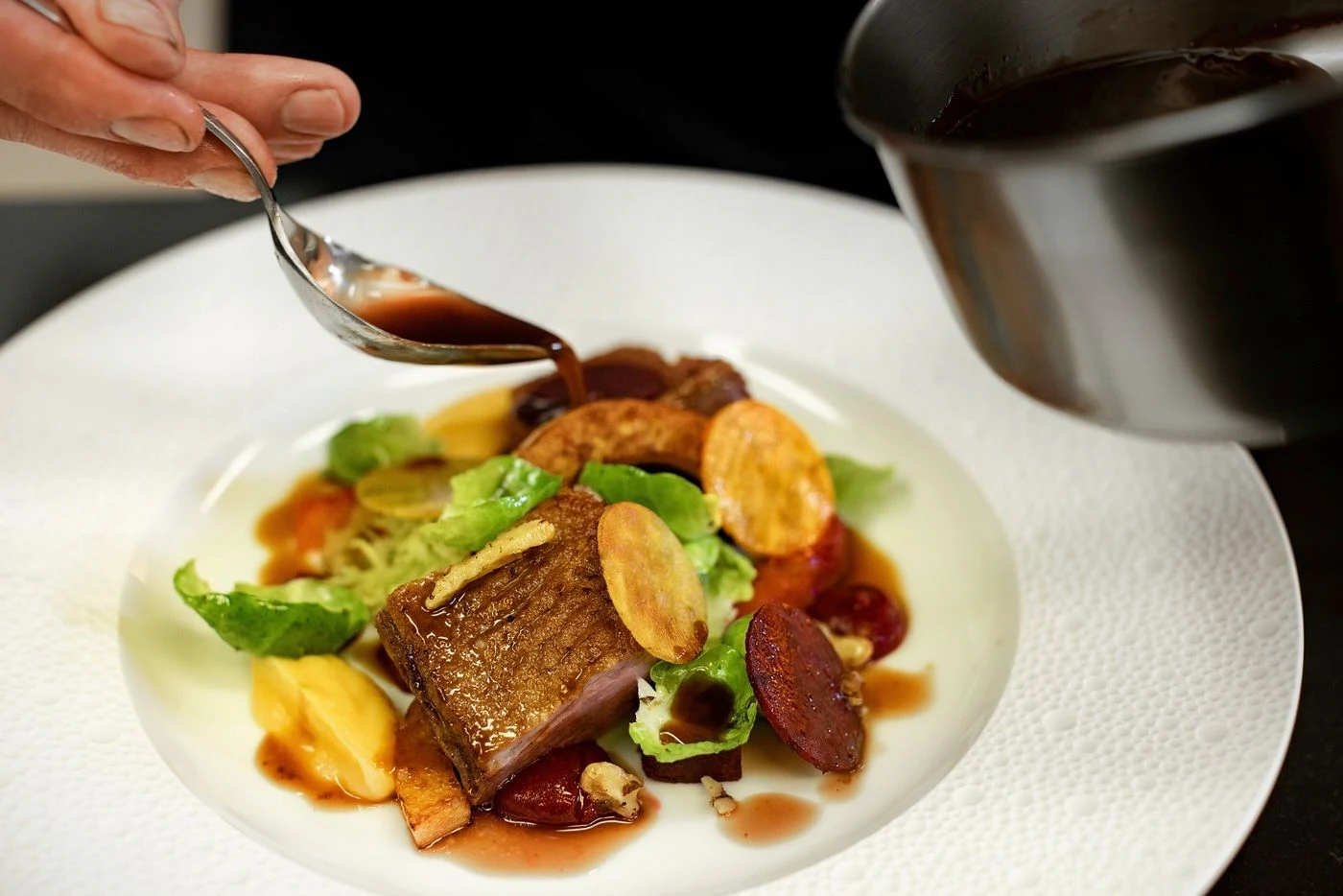 a plate of food aboard GLADIATOR Yacht for Sale