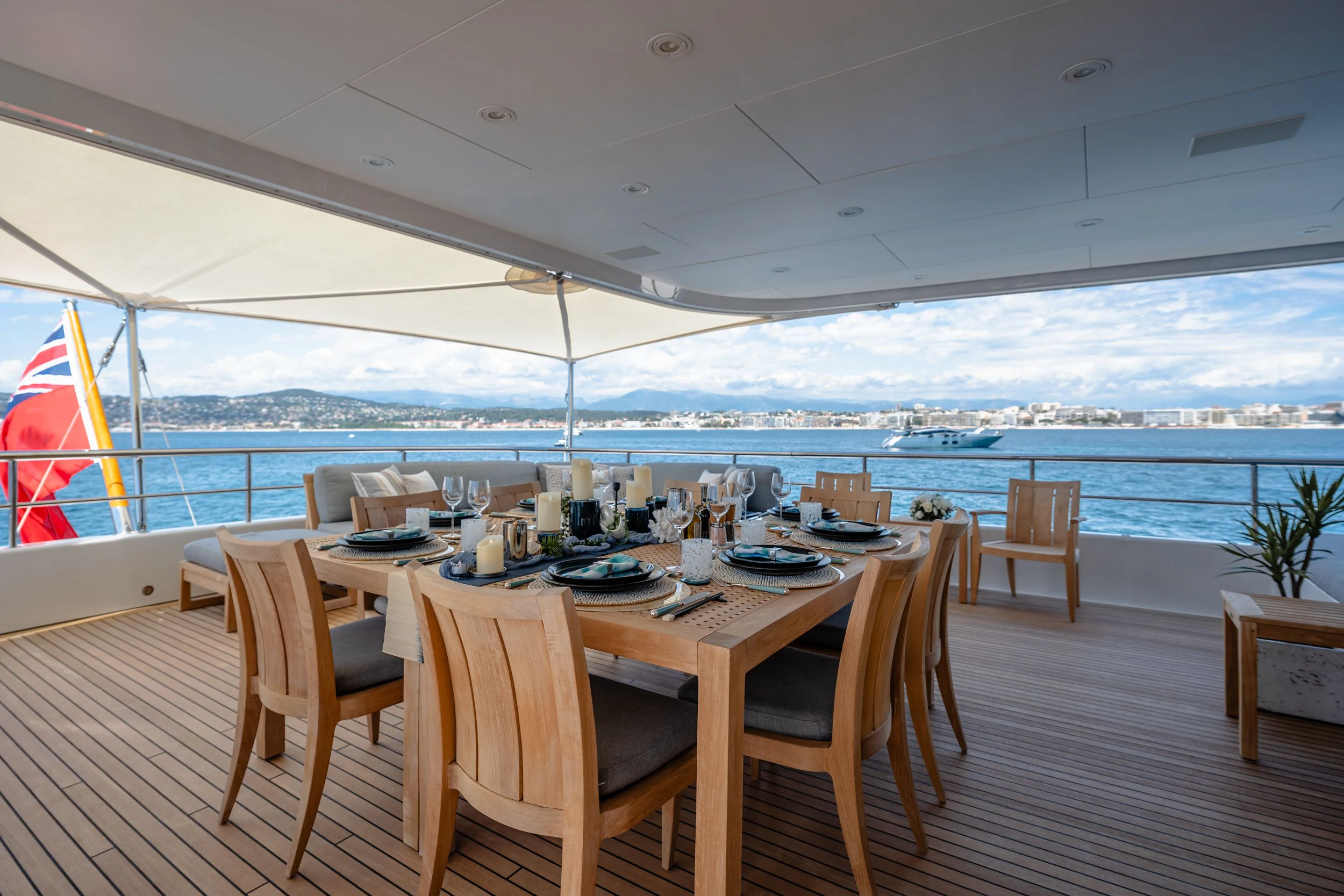 a table set for a meal aboard GLADIATOR Yacht for Sale