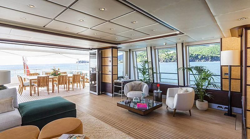 a living room with a large open window aboard GLADIATOR Yacht for Sale